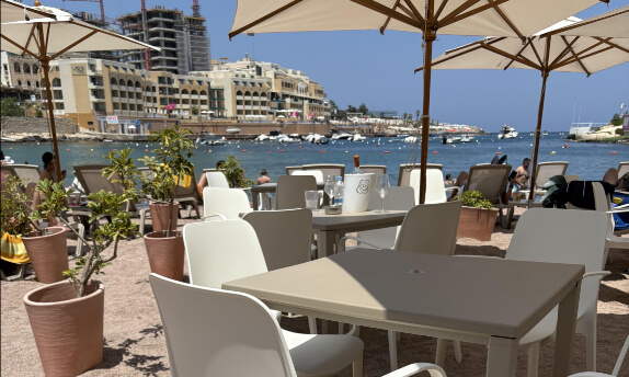 The terrace at Raffael in Malta, with veiws over Spinola Bay